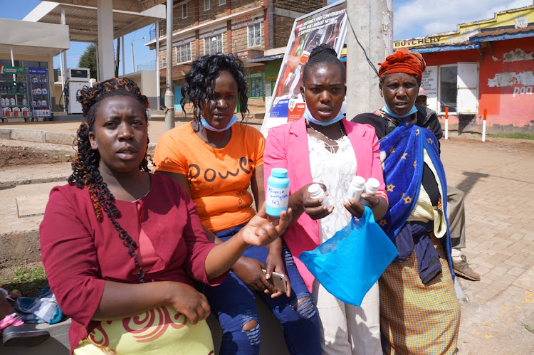 Magina village women in Lari show some of the medicines the two girls who were defiled have been using.