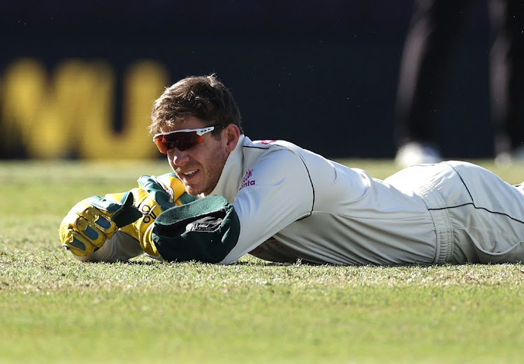 Tim Paine of Australia reacts after dropping a catch off Hanuma Vihari of India during day five of the 3rd Test match in the series between Australia and India at Sydney Cricket Ground on January 11, 2021 in Sydney, Australia.