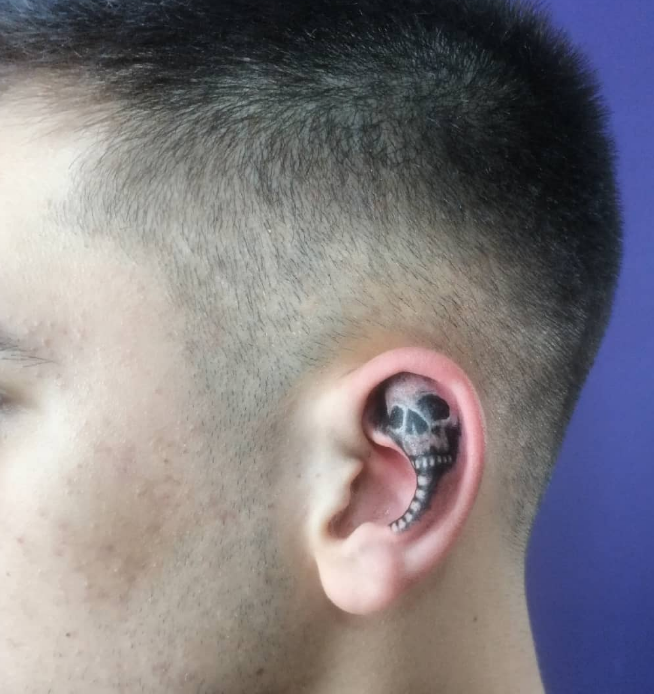 Behind the ear tattoo