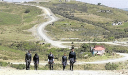 LONG AND WINDING ROAD ENDS: Grade 8 to 12 pupils from Zixambuzi village near Ngqeleni in Eastern Cape walk about 30km every day to and from Ntshilini High School. Photo: LULAMILE FENI