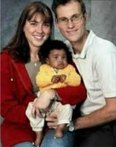 Black baby white family has White mother,