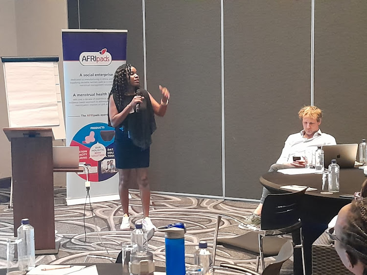 Afripads Partnerships and Training Associate Gloria Nirere speaking during a networking forum menstrual products uptake insights in Nairobi on September 21, 2023.