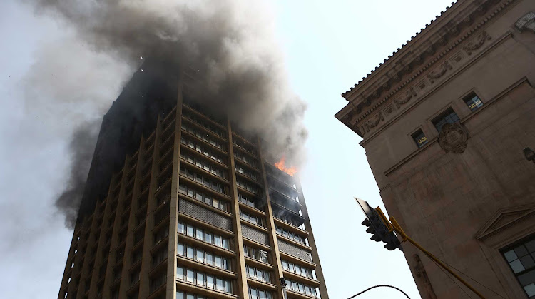 For a second day in a row fire can be seen in a building that houses three provincial departments in the inner city.