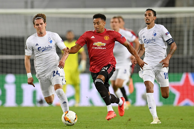 Jesse Lingard of Manchester United runs with the ball during the UEFA Europa League quarterfinal against FC Copenhagen at Rhein Energie Stadion on August 10, 2020 in Cologne, Germany