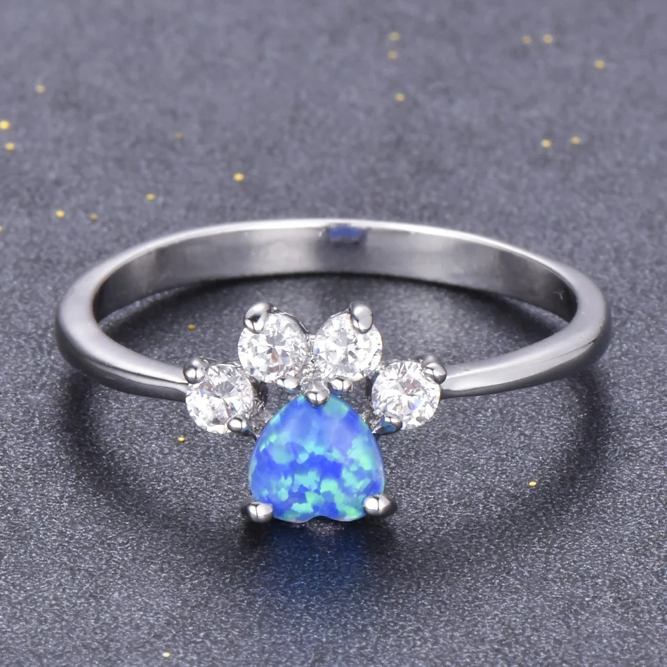 Bague Opale Coeur Empreinte Or Rose. Un cadeau touchant pour chérir les souvenirs précieux et exprimer l'amour éternel.