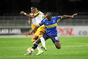 City's Siphelele Mthembu faces   George Maluleka of Chiefs.  