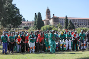 Striking Sibanye-Stillwater gold mineworkers sing struggle songs on the lawns of the Union Buildings in Pretoria.