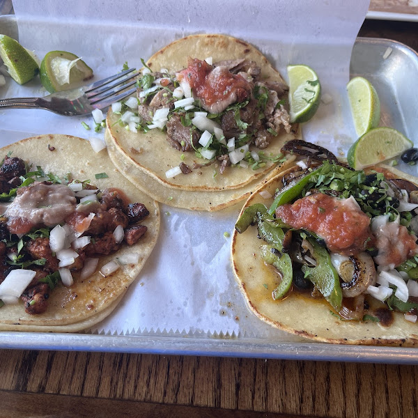 Veggie, Al Pastor and Carnitas tacos