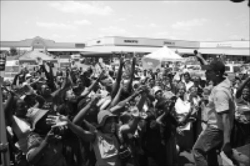 MESMERISED: Ligwalagwa FM's DJ Mavusana at a TB roadshow campaign in Kwaggafontein Plaza, Mpumalanga . 123/11/08. Pic. Alfred Moselakgomo. © Sowetan.