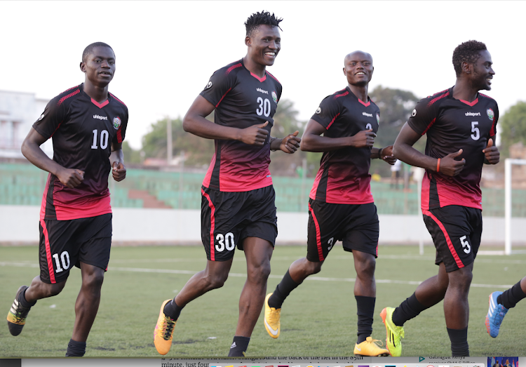 Michael Olunga (2nd R) with Eric Johanna (L) Dennis Odhiambo and Musa Mohamed (R) during previous training