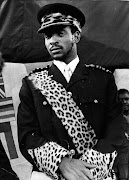 King Goodwill Zwelithini Zulu, seen here when he was 23 years old, dressed in a navy blue military type suit with peaked cap and leopard skin trimmings, during his installation as Zulu king in Nongoma on December 3 1971. 