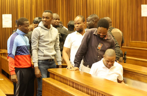 'There was communication between the accused,' Senzo Meyiwa trial hears