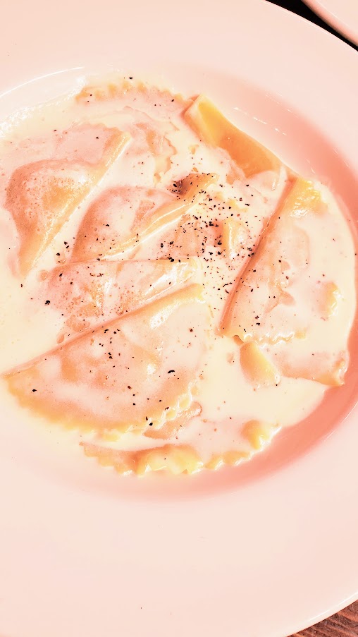 Ravioli di Zucca, Pumpkin ravioli with butter cream truffle cheese sauce at Maccheroni Republic in downtown LA offering homemade fresh organic pasta