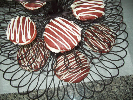 Red velvet whoopie pies with a cream cheese icing.