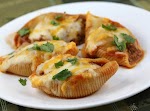 Enchilada Stuffed Shells was pinched from <a href="http://blogchef.net/enchilada-stuffed-shells-recipe/" target="_blank">blogchef.net.</a>