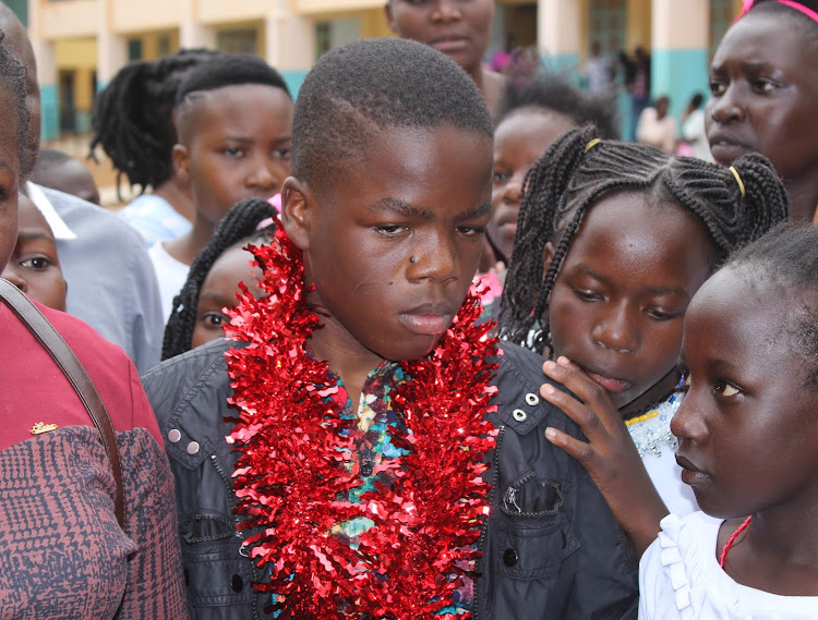 Top KCPE student Robinson Fwaro speaks to journalist at Christ the King Primary School in Bungoma on December 21