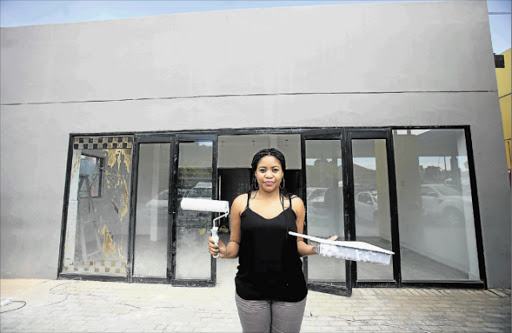 SHOULDER TO THE WHEEL: Zizipho Dyani, 29, an account manager at Algoa FM, left her job and her East London home to live her dream of becoming a water entrepreneur in the rural town of Butterworth Picture: SINO MAJANGAZA