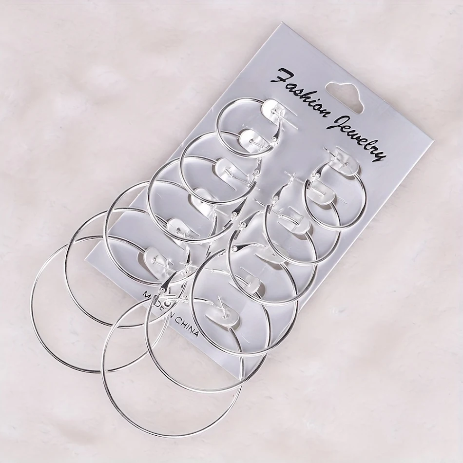 Pendientes de aro metálicos exagerados, versátiles y clásicos de moda europea y americana, para un look con personalidad.