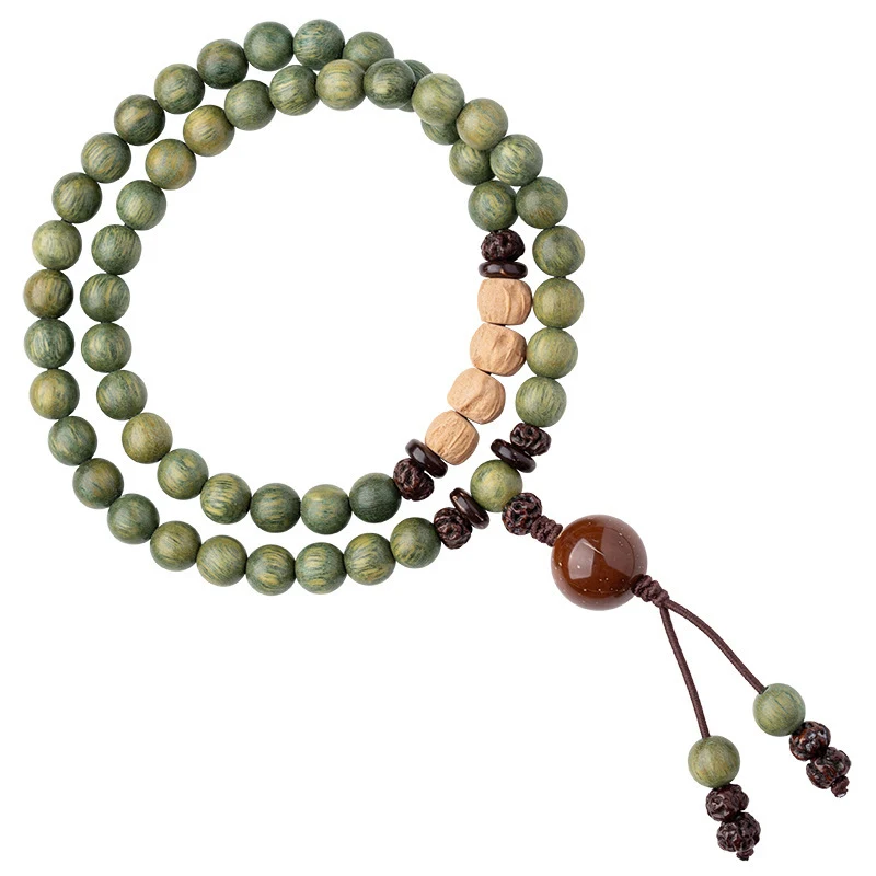 Sandelhouten gebedskralen armband voor dames. Bevordert rust, meditatie en spiritueel welzijn. Een stijlvol en betekenisvol accessoire.