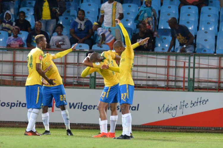 Percy Tau celebrates his goal with Mamelodi Sundowns players during the Absa Premiership match between Mamelodi Sundowns and Maritzburg United at Loftus Versfeld on December 13, 2017 in Pretoria, South Africa.