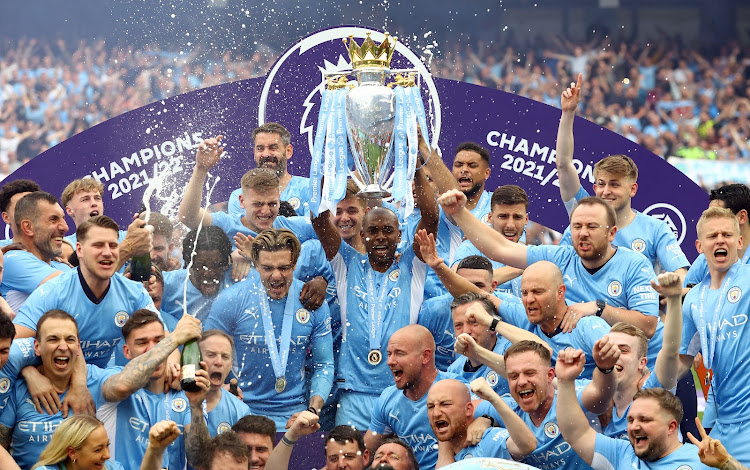 Manchester City celebrate winning the Premier League. Picture: REUTERS/HANNAH MCKAY