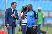 Mamelodi Sundowns coach Pitso Mosimane and Platinum Stars' head coach Roger De Sa during the Absa Premiership match between Mamelodi Sundowns and Platinum Stars at Loftus Versfeld Stadium on January 20, 2018 in Pretoria.