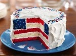 Red, White and Blue Layered Flag Cake was pinched from <a href="http://www.tablespoon.com/recipes/red-white-and-blue-layered-flag-cake-recipe/1/" target="_blank">www.tablespoon.com.</a>