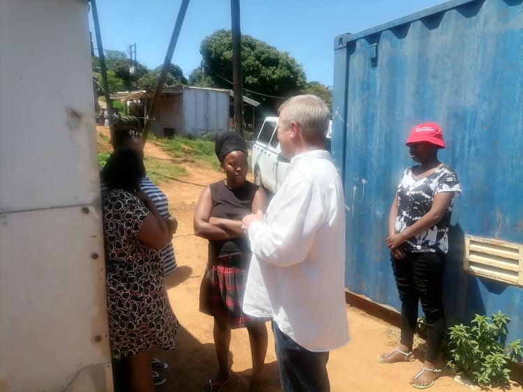 DA Kwazulu-Natal leader Francois Rodgers visits the KwaMathe transit camp in Lamontville, Durban, on Tuesday.