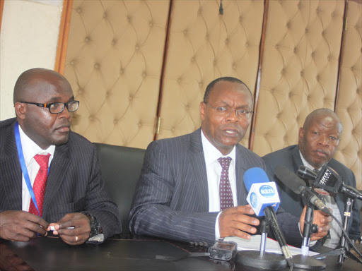 KEBS head of quality assurance department Erick Chesire (left),Managing director Charles Ongwae with standard development and trade director Charles Gachahi at the KEBS briefing on Importation of Vehicles in Nairobi on March 16. /Enos Teche