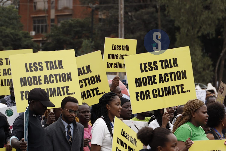 Civil society group members protest against the ongoing Africa Climate Summit at Green Park bus terminus on September 4, 2023