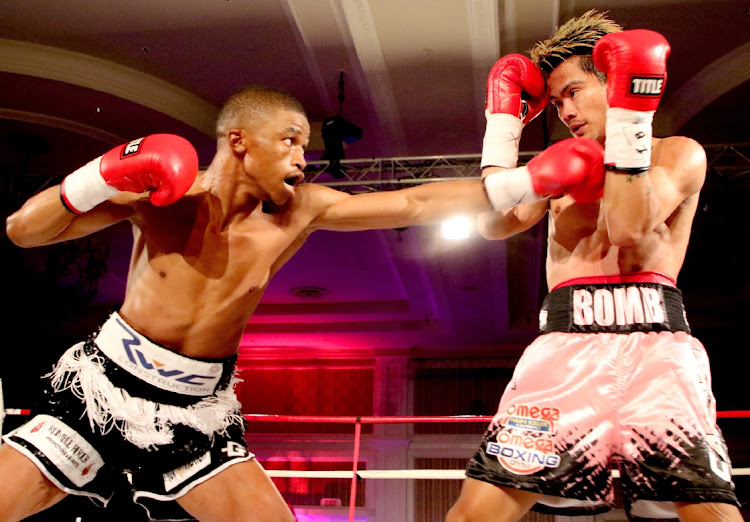 Sive Nontshinga in action against Christian Araneta of the Philippines in Gqeberha in April 2021.