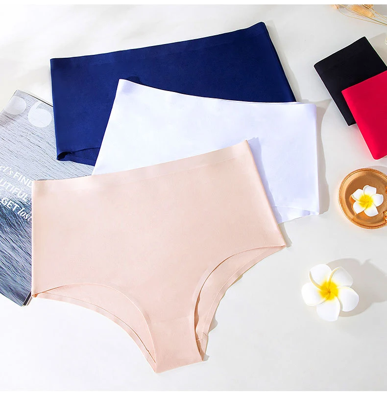 Naadloze sportshorts voor dames, uit één stuk, effen kleur, middelhoge taille. Perfect voor trainingen en vrijetijdsactiviteiten, comfortabel en stijlvol.