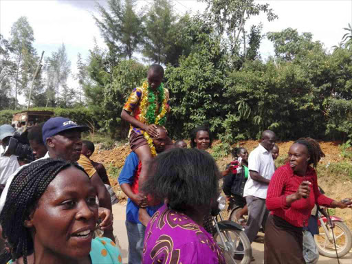 Victor Odhiambo in celebrated in Kakamega county after attaining 437 marks, the highest 2016 KCPE exam score, December 1, 2016. /HILTON OTENYO