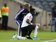 Orlando Pirates interim coach Rulani Mokwena gives instruction to forward Gabadinho Mhango during a match. 