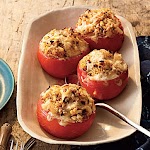 Baked Tomatoes with Quinoa, Corn, and Green Chiles was pinched from <a href="http://www.myrecipes.com/recipe/baked-tomatoes-50400000121356/" target="_blank">www.myrecipes.com.</a>