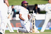 Kraigg Brathwaite of the West Indies reacts after being hit by a ball during day two of the First Test match in the series between New Zealand and the West Indies at Seddon Park on December 04, 2020 in Hamilton, New Zealand. 