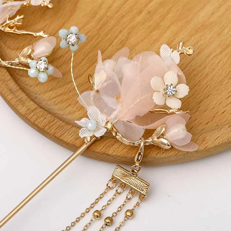 Complete set haaraccessoires met haarspelden en kwastjes, elegante haarversieringen voor kapsels en speciale gelegenheden.