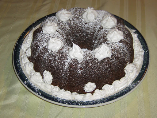 I used a Whippy Cream Frosting that I found a couple years ago. I piped it into the cake and used for topping.