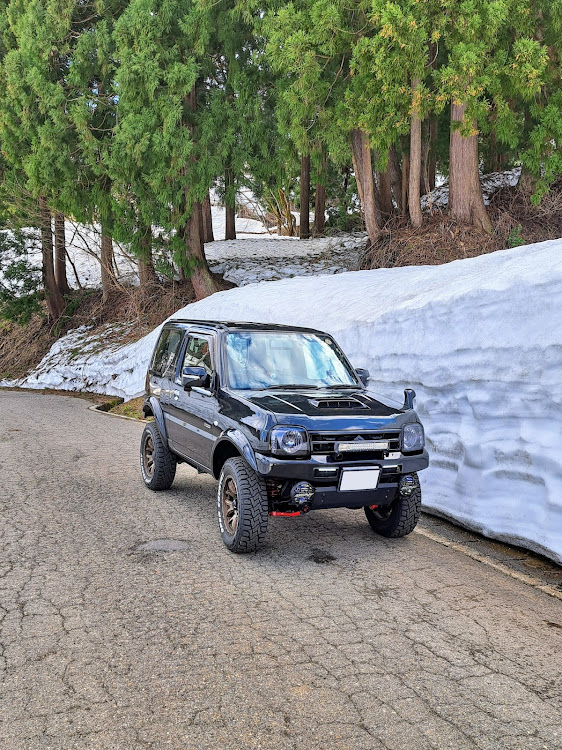 ジムニーのドライブ・雪の山脈と・桜はまだまだ蕾ですに関するカスタム事例の投稿画像2枚目
