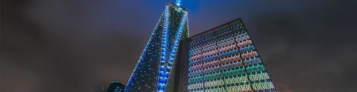 Colorfully lit-up sky scraper at night