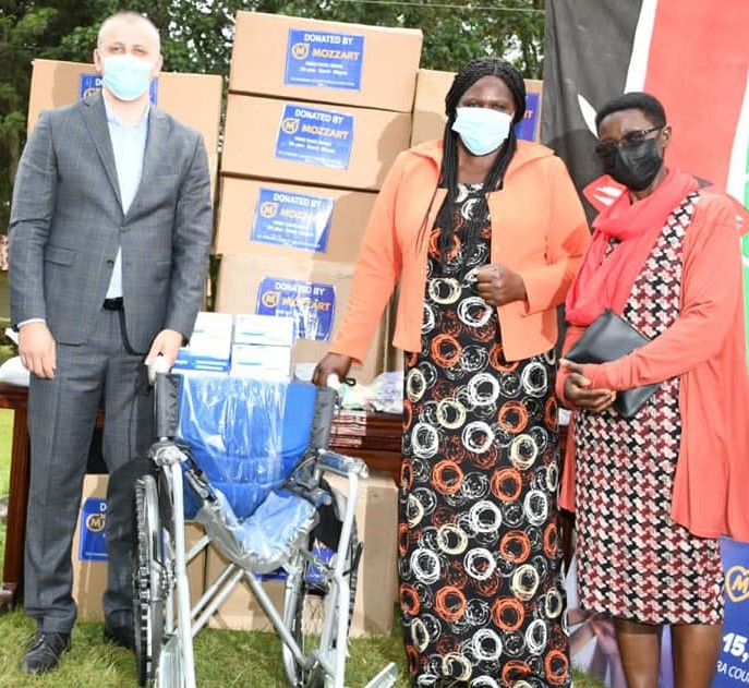 Mozart bets Manager Sasa Krneta with Health CEC Gladys Momanyi and gender CEC Grace Nyamongo when they received the donation from Mozart bet in Nyamira town on Friday August 20,2021