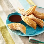 Citrus-and-Spice Churros with Mocha Sauce was pinched from <a href="http://www.myrecipes.com/recipe/citrus-spice-churros" target="_blank">www.myrecipes.com.</a>