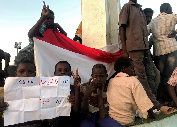 Sudanese demonstrators attend a mass anti-government protest at the Nyala market in South Darfur on Wednesday, April 24, 2019