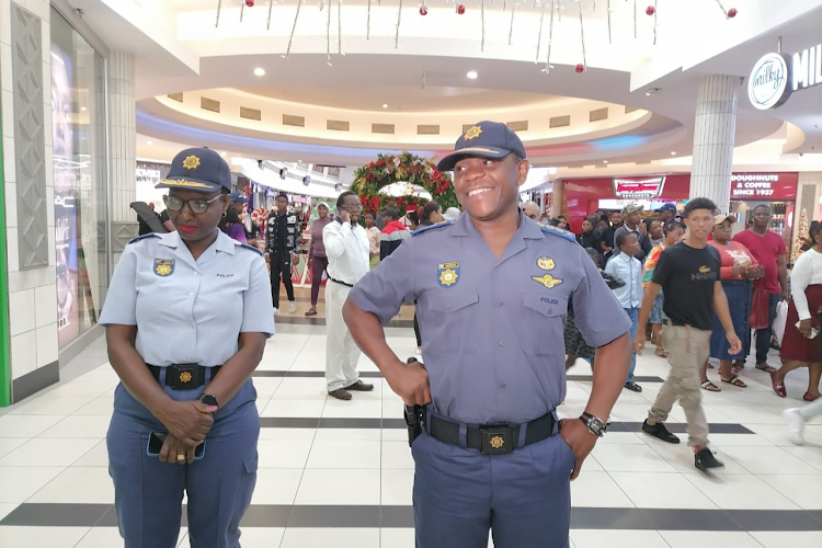 KwaZulu-Natal police commissioner Lt-Gen Nhlanhla Mkhwanazi (right) and colleague Phumelele Makhoba during a walk-about at Pietermaritzburg's Liberty Mall.