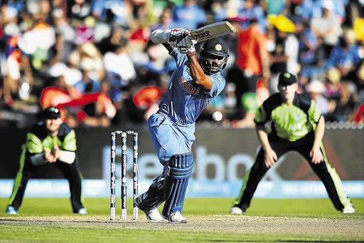 ON A ROTI: Indian opener Shikhar Dhawan on his way to making 100 against Ireland at Seddon Park in Hamilton yesterday. India made it five wins from five by beating the Irish by eight wickets