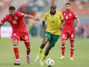 Bafana Bafana striker Evidence Makgopa is challenged by Hamza Rafia of Tunisia during their Africa Cup of Nations (Afcon) match at Amadou Gon Coulibaly Stadium in Korhogo.