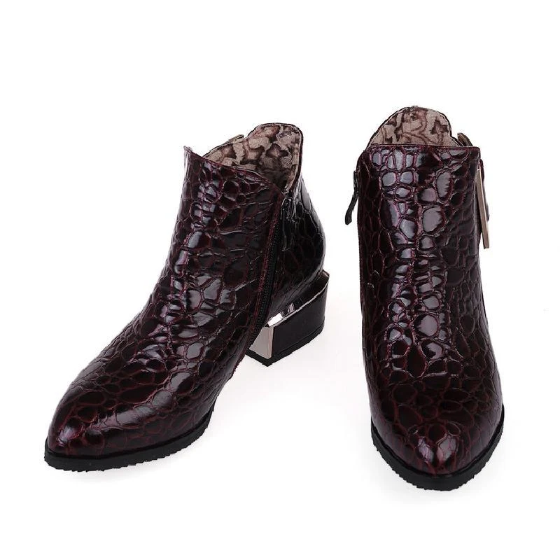 Patent leather block heel Martin boots for a stylish and comfortable look. Perfect for everyday wear and adding a touch 