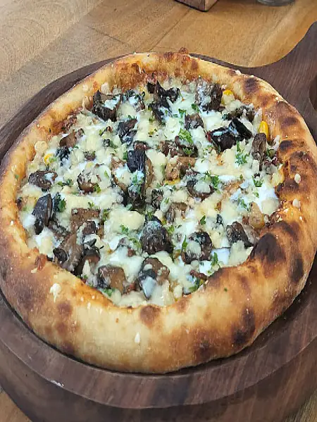 Wild Mushrooms And Emmental Cheese Pizza