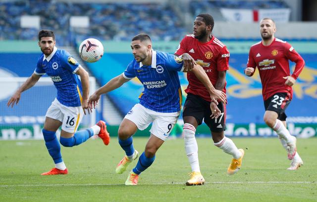 Brighton's Neal Maupay in action with Manchester United's Fred