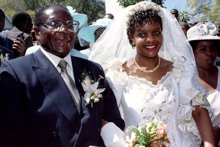 Then president Robert Mugabe and his wife Grace leave the Kutama Catholic Church in Zimbabwe August 17 1996 after exchanging their wedding vows.